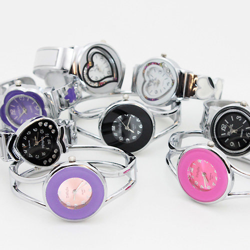 10 x Wundersch&ouml;ne Armreif-Uhren Edelstahl - in verschiedene Designs sortiert